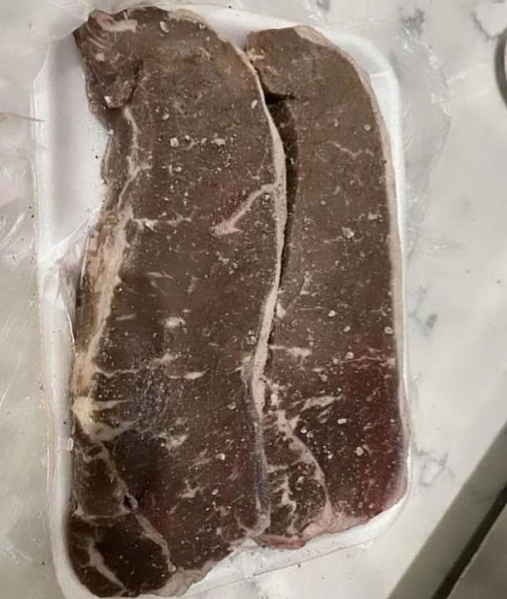 It expired today and I know browning can be normal. It smells a little bit funny (but I can’t really tell because the smell of raw meat makes me nauseated anyways). I just added salt and pepper and cooking it now. I paid  for it so I’m gonna eat it…