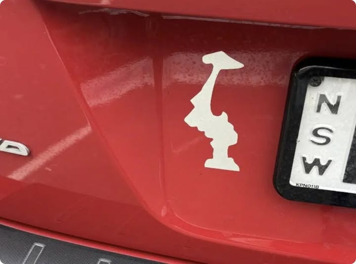 Why Drivers Display This Upside-Down Sticker on Their Cars