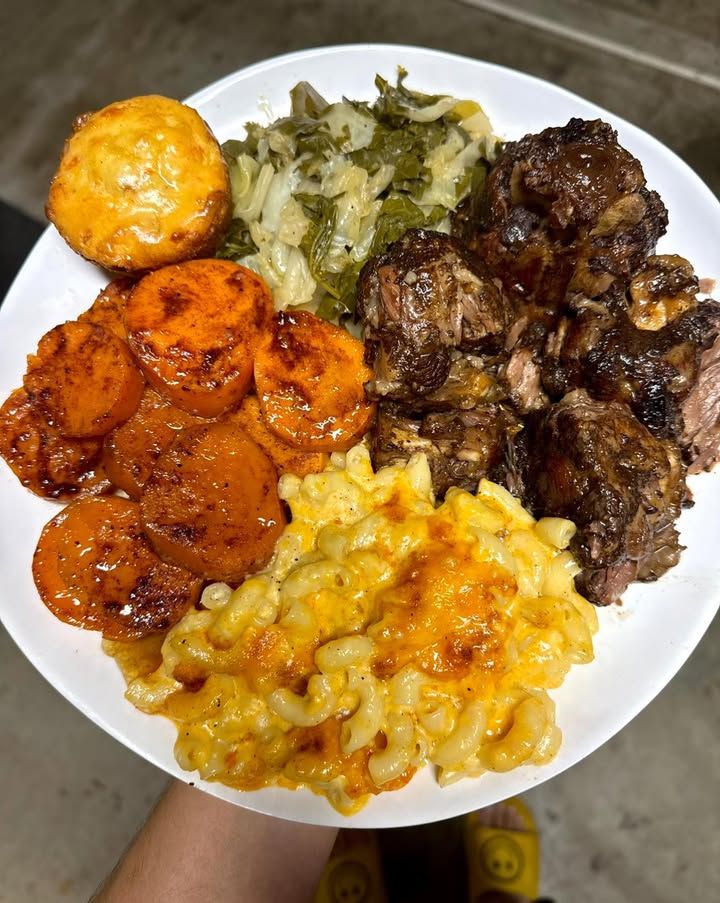 Oxtail plate with mixed greens, candied sweet potatoes and baked mac 🔥🔥🔥🔥🔥🔥